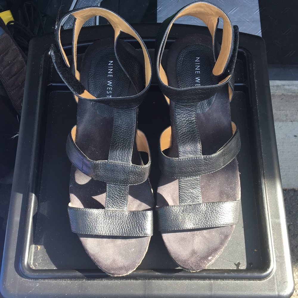 Black leather wedge sandals